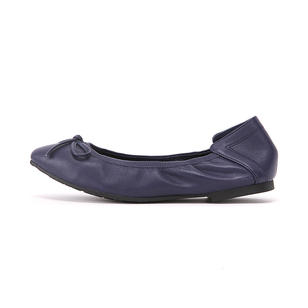 Round toe with soft sole and bow decoration