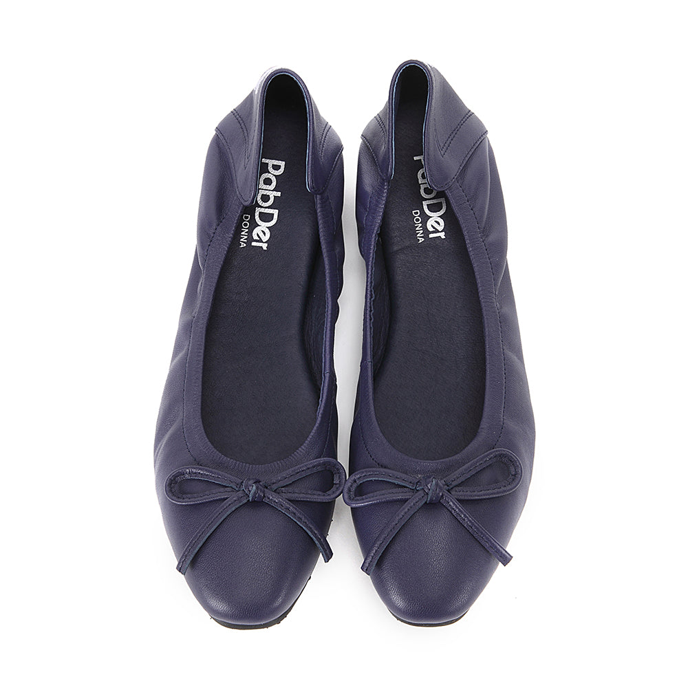 Round toe with soft sole and bow decoration