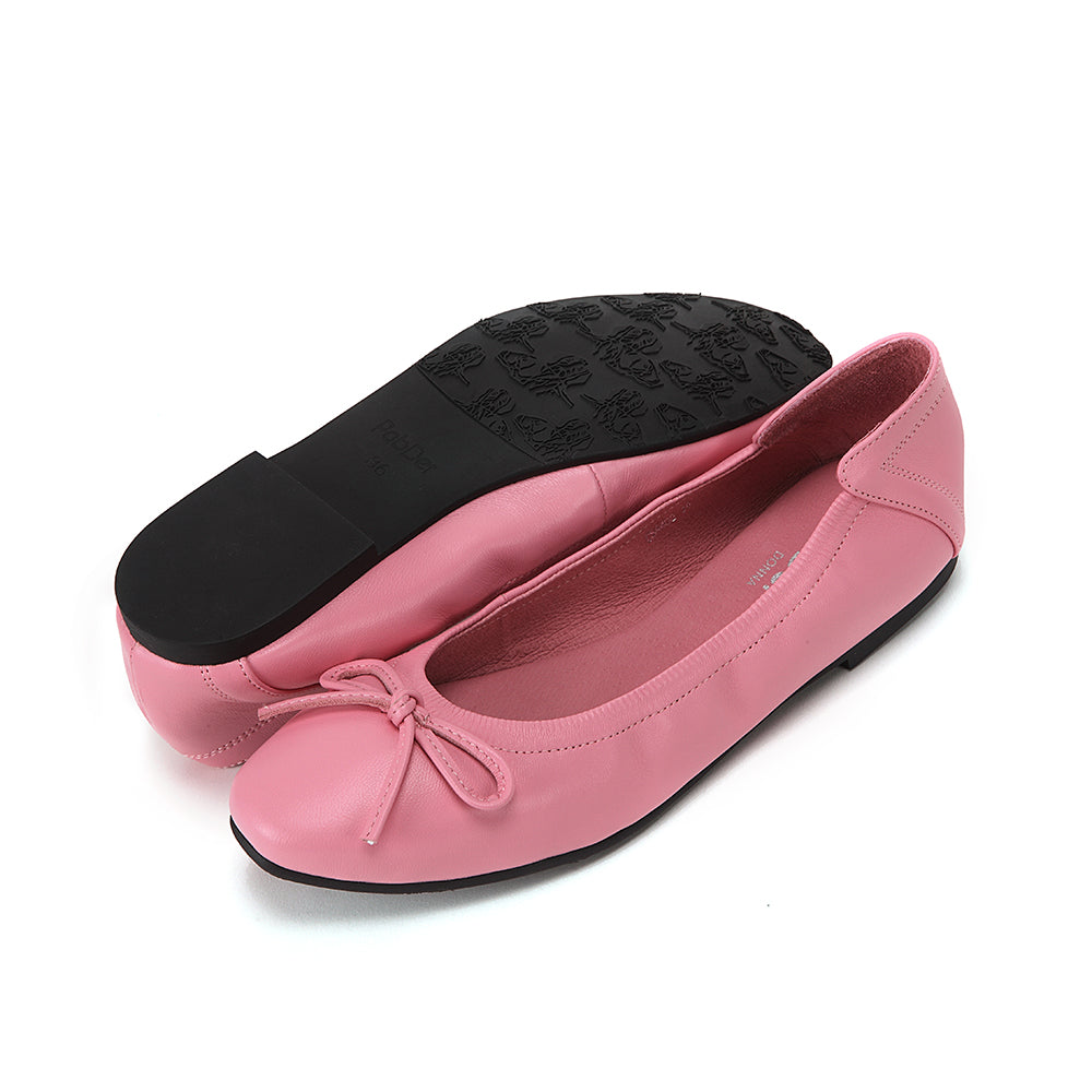 Round toe with soft sole and bow decoration