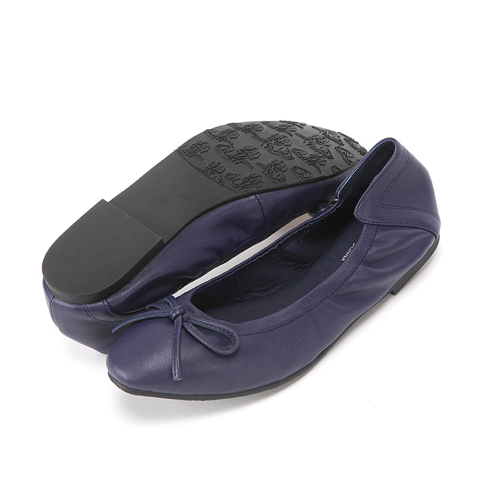 Round toe with soft sole and bow decoration