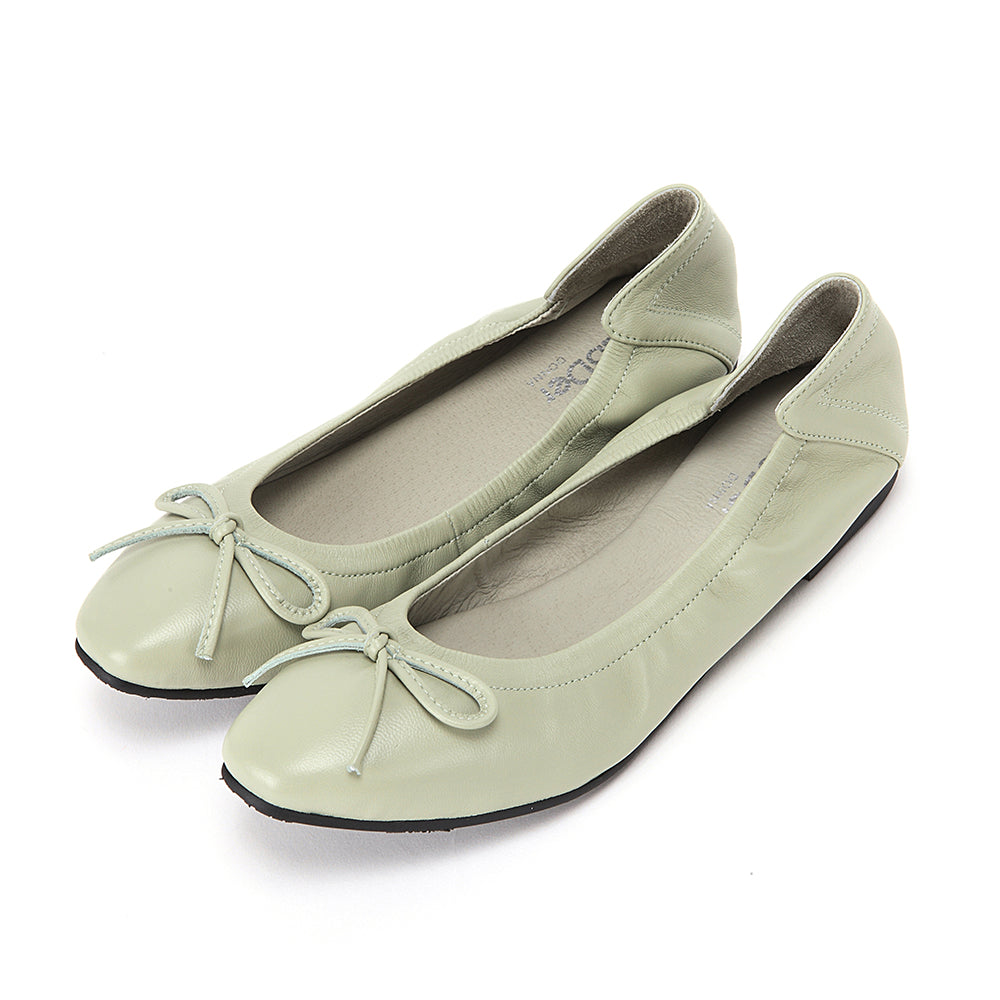 Round toe with soft sole and bow decoration