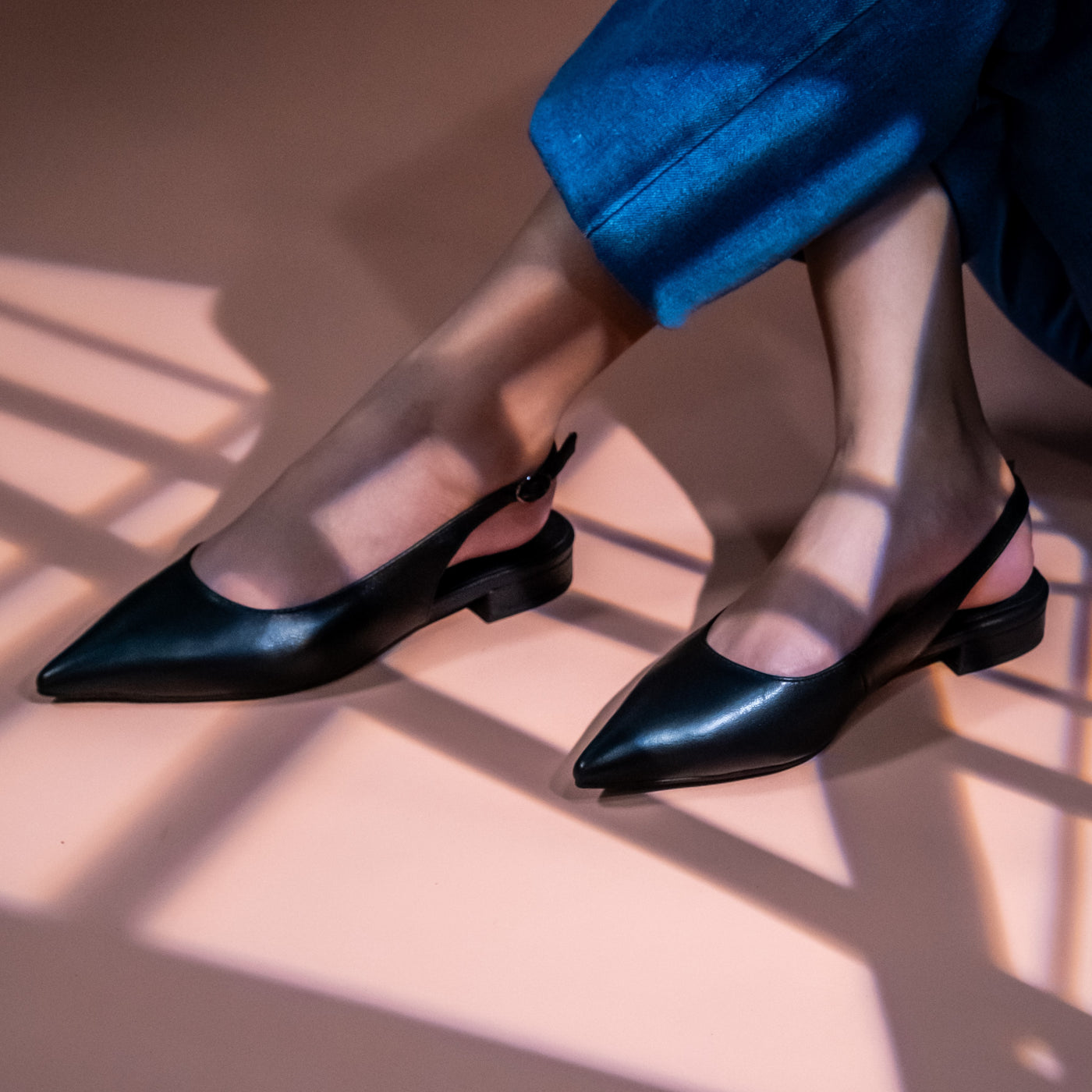 Pointed Toe Sling-Back Flats.